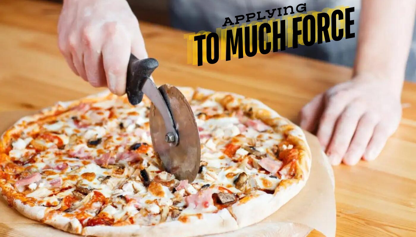 applying excessive force pizza cutter